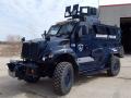 Cover-Militarized-Police-Armored-Vehicle-08132015