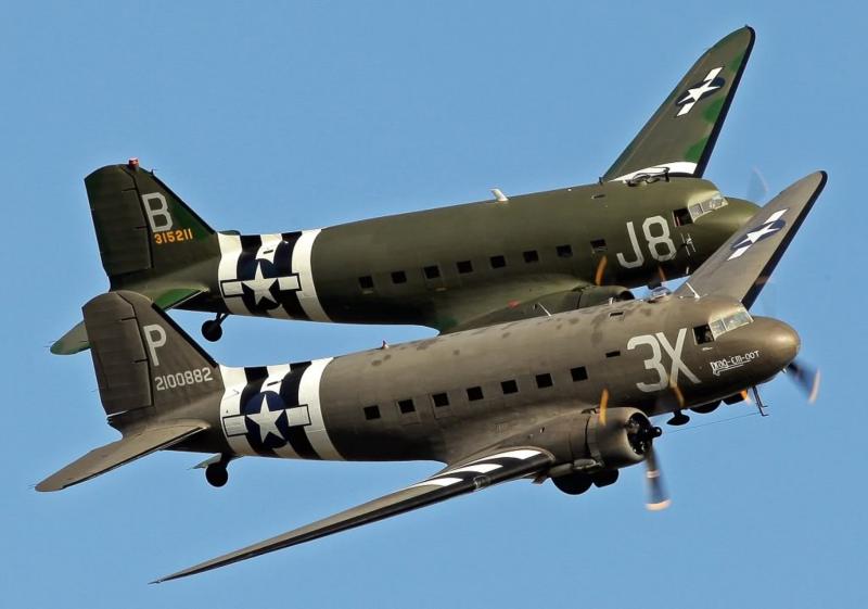 Project-Two-restored-Douglas-DC-3-C-47-Dakota-Skytrains-in-formation-during-an-airshow