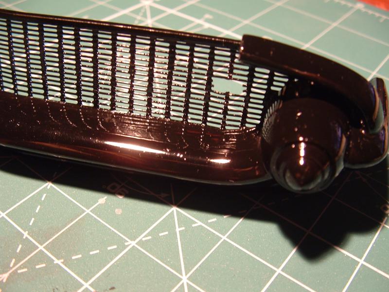 Chevrolet Belair 1/12 első lökhárító -1

Krómozás előtt, még "humbrolfeketén"