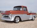 0810clt_01_z+1957_chevy_stepside_truck+front_side_view