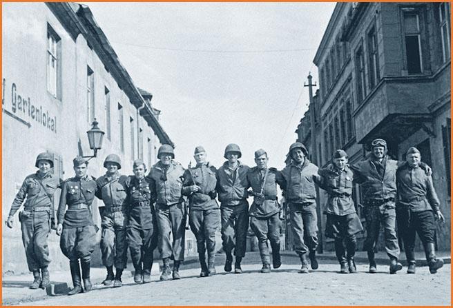 Soviet and US soldiers in the street of a German Town