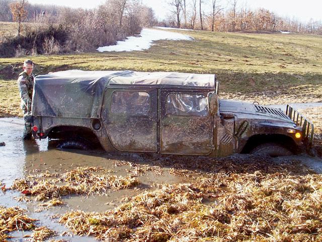 131_0605_06_z+hmmwv_hummer+passenger_side_mud