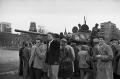 Around a Hungarian T-34 tank, already painted with the Hungarian national emblem