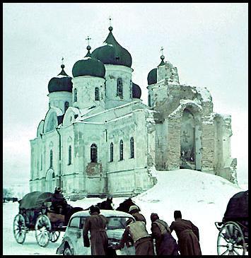 Hungarian AA Artillery, Don Front, 1942

Most likely during January, 1943, Axis traffic is shown here by a Russian cathedral located on the Don River -- I do not know the exact location. German style wagons pass by and a group of Hungarian soldiers are tending to a car (Opel?) -- probably all frozen in the winter cold. 



