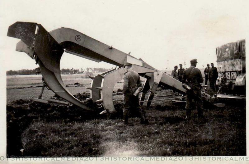 Trench digging plow in field (grabenpflug)- WWII Photo
