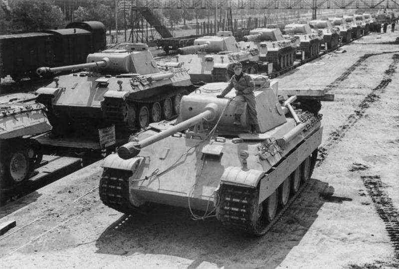 Panzer V Panther Ausf. D medium tanks on rail cars waiting to be shipped to the front, Apr-May 1943