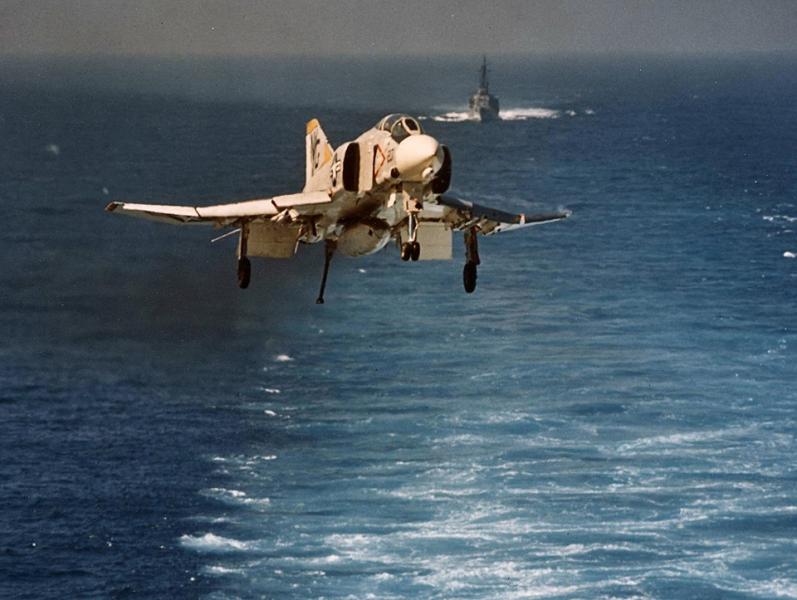 An F-4B Phantom II of Fighter Squadron (VF) 92 on approach for recovery on board the carrier Enterprise (CVAN 65) steaming in the Western Pacific off Vietnam #OTD in 1966.