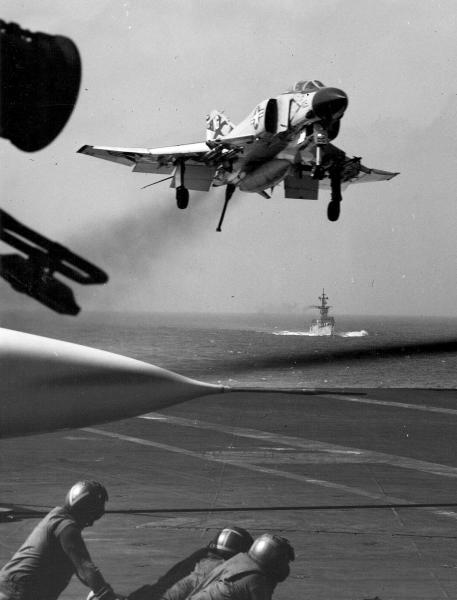 An F-4J Phantom II of Fighter Squadron (VF) 96 on approach for recovery on board the carrier Constellation (CVA 64) underway in the Western Pacific during operation off Vietnam in 1972.