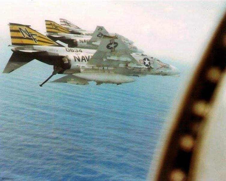 US Navy F-4B VF-151 coming back home to USS Midway while deployed in the Gulf of Tonkin , following another combat mission over the Vietnam, circa 1972.