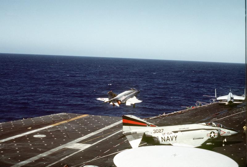 VF-21 being launched from the flight deck of the aircraft carrier USS CORAL SEA (CV-43).