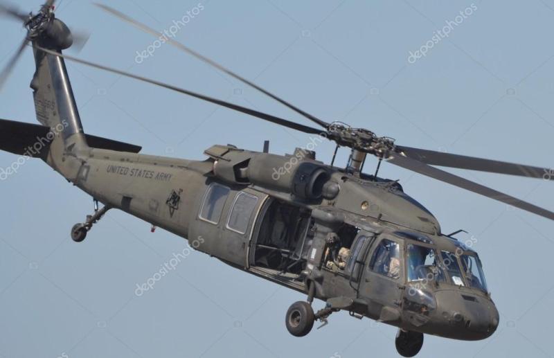 depositphotos_76415307-stock-photo-uh-60-black-hawk-helicopter