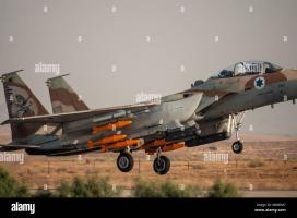 a-israeli-f-15i-raam-multirole-interceptorbomber-takes-off-with-practice-bombs-colored-orange-and-full-of-water-W80EM7