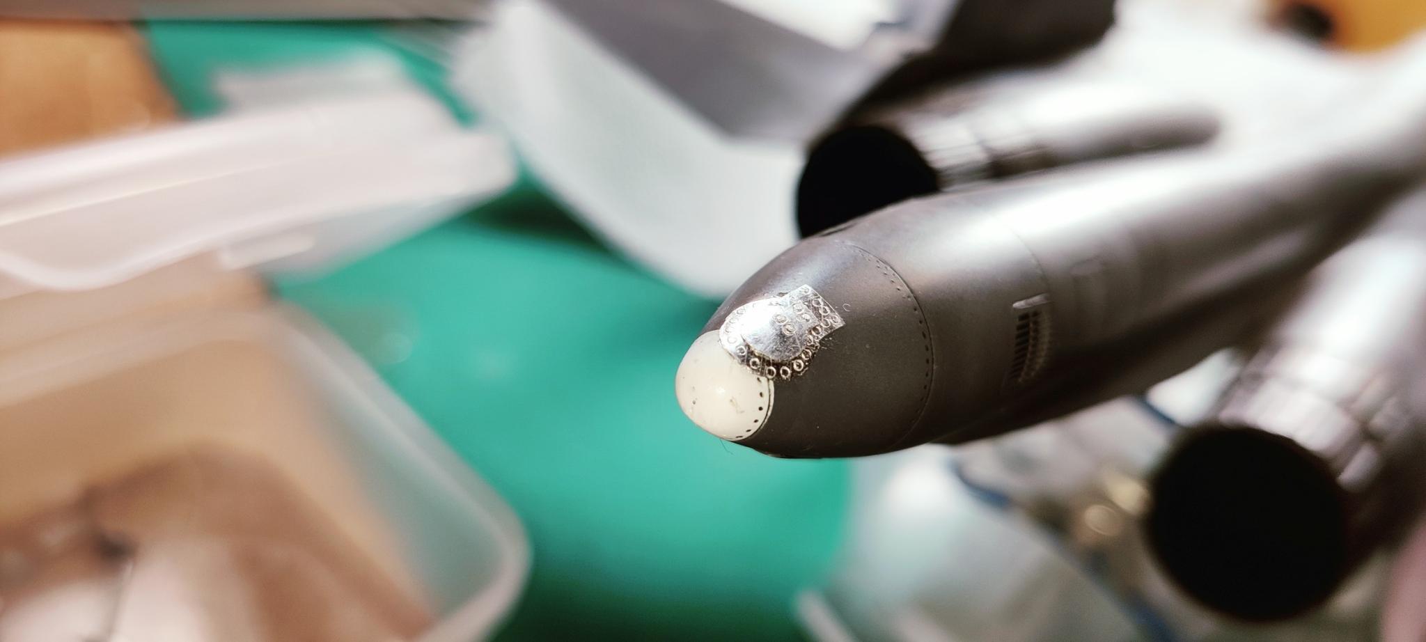 APU kiömlő burkolata